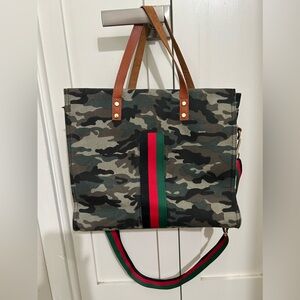 Camo print canvas tote with accent stripe and crossbody strap